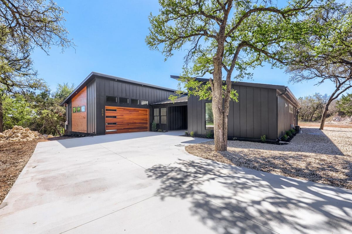 View 504 District Ln in Point Venture 02 Sec 01 504 District Ln - front exterior - Luxury home in Point Venture 02 Sec 01, Lago Vista, TX