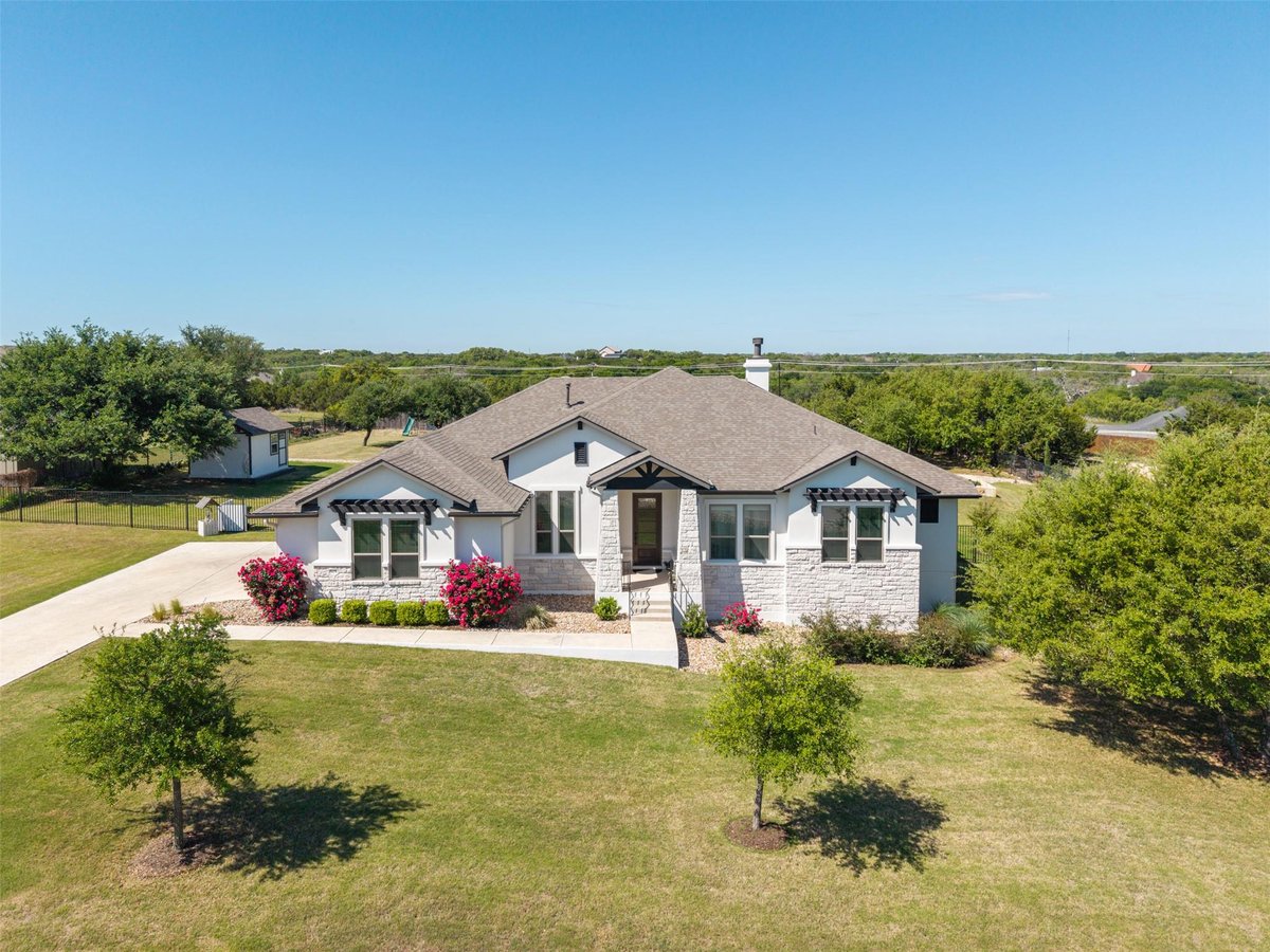 View 505 Lodge Ct in Estates Of Northgate 505 Lodge Ct - front exterior - Luxury home in Estates Of Northgate, Liberty Hill, TX