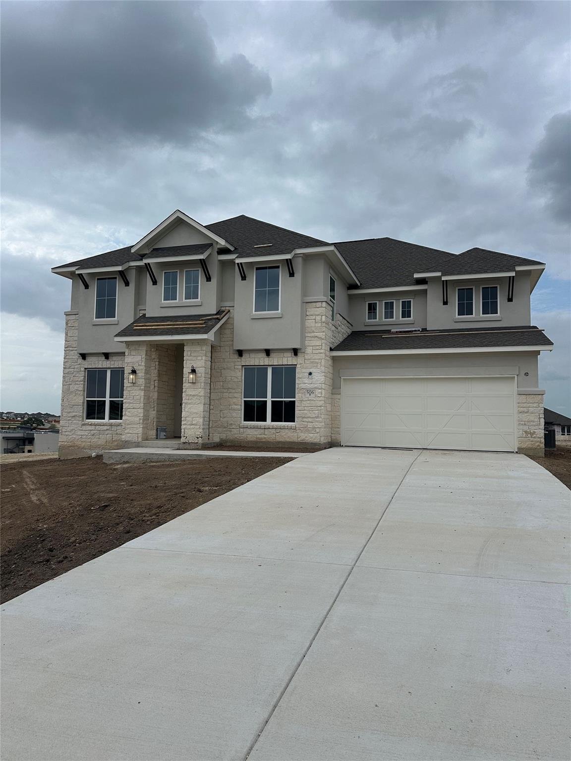 View 506 Uphill CT in Lariat 506 Uphill CT - front exterior - Luxury home in Lariat, Liberty Hill, TX
