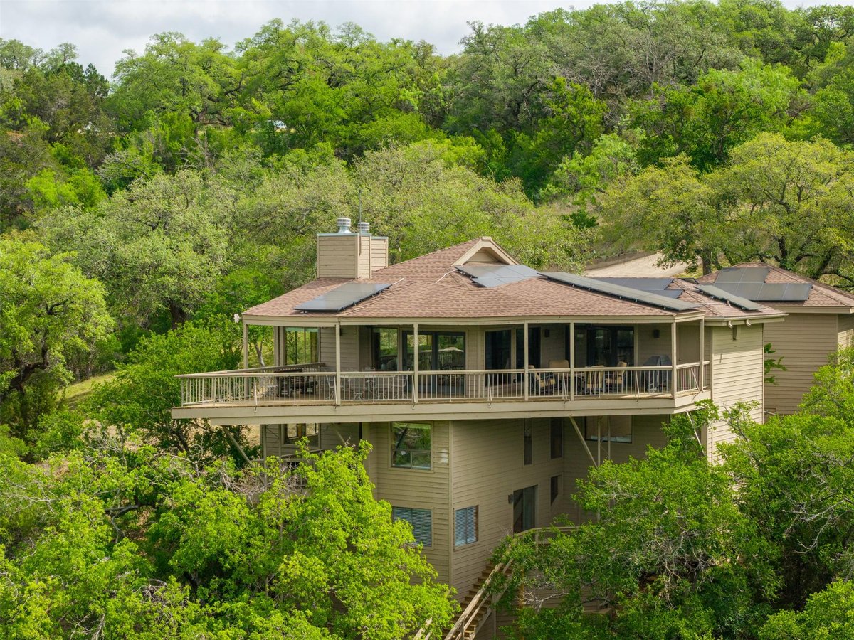 View 509 Coventry Rd in Windermere Oaks 509 Coventry Rd - front exterior - Luxury home in Windermere Oaks, Spicewood, TX