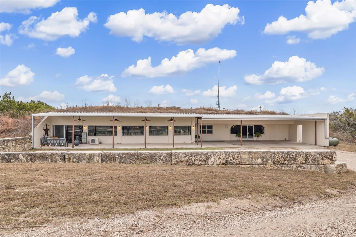 View 510 Herrin Ln in William S Hotchkiss Surv 16 Ab 510 Herrin Ln - front exterior with 510 Herrin Ln in Bertram - Luxury home in William S Hotchkiss Surv 16 Ab, Bertram, TX