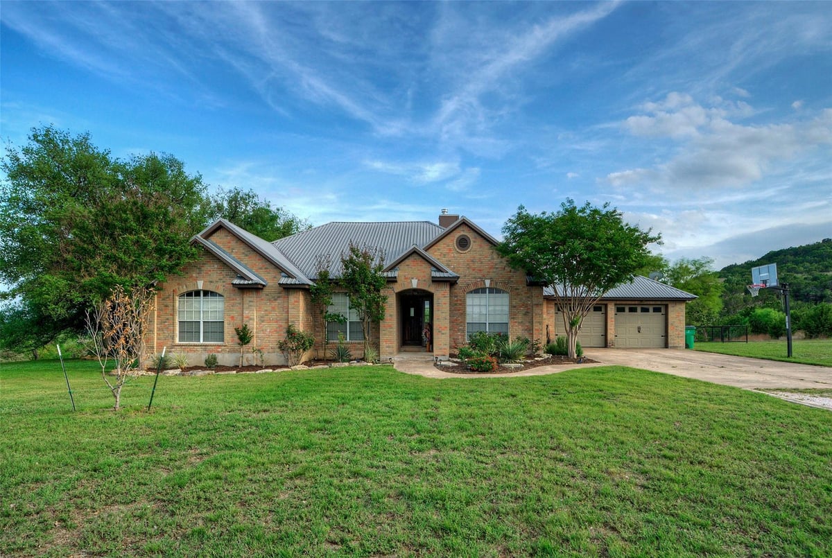 View 511 Chaneys Xing in Whitewater Springs 511 Chaneys Xing - front exterior - Luxury home in Whitewater Springs, Bertram, TX