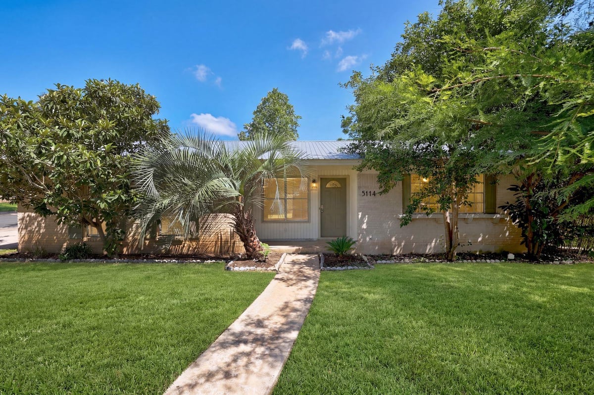 5114 Emerald Forest DR - property photo 1 - Luxury home in Emerald Forest Sec 05, Austin, TX