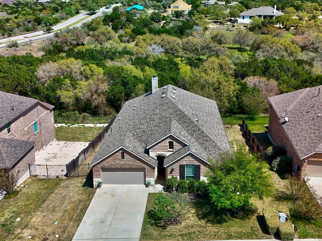View 5117 Texas Bluebell Dr in West Cypress Hills 5117 Texas Bluebell Dr - front exterior - Luxury home in West Cypress Hills, Spicewood, TX