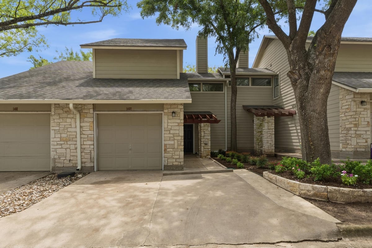 View 512 Eberhart LN Unit #1402 in Sweetbriar Garden Homes Condom 512 Eberhart LN Unit #1402 - front exterior - Luxury home in Sweetbriar Garden Homes Condom, Austin, TX