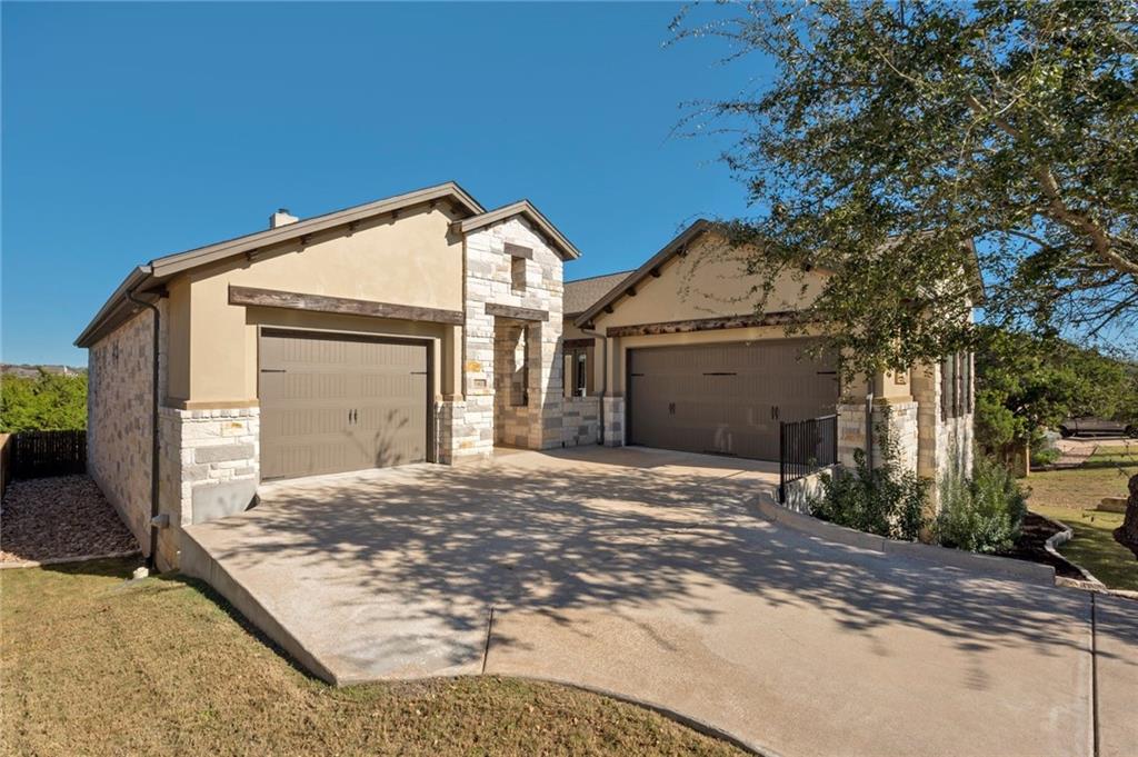 View 512 Naples Ln in Belterra Ph 4 Sec 18 512 Naples Ln - front exterior - Luxury home in Belterra Ph 4 Sec 18, Austin, TX