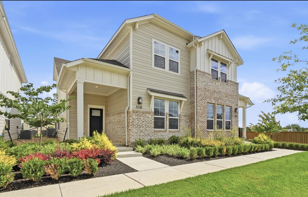 View 513 Burlington DR Unit #B in Townhomes At The Porch Du Pre 513 Burlington DR Unit #B - front exterior - Luxury home in Townhomes At The Porch Du Pre, Buda, TX