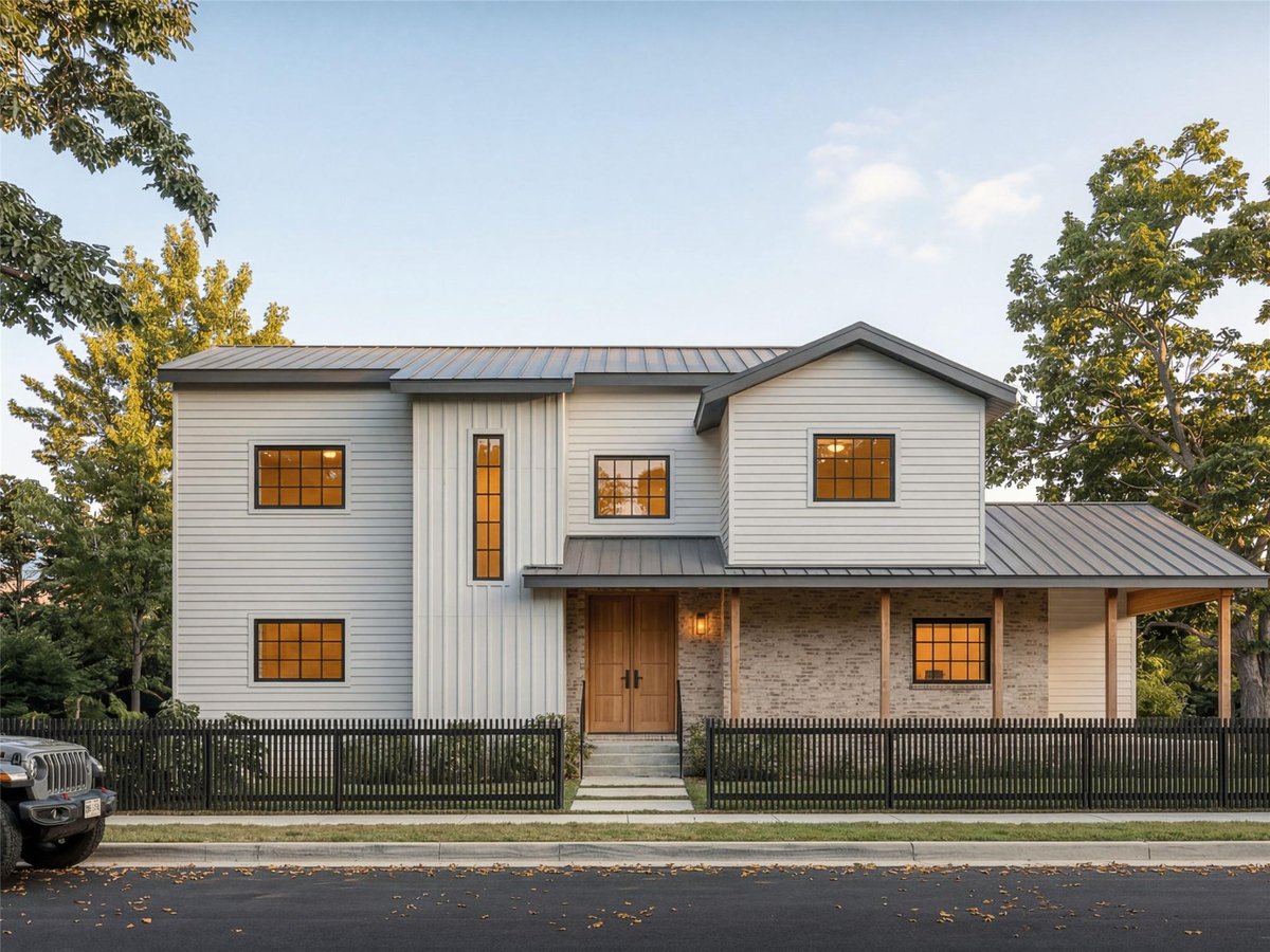 View 514 E Live Oak St in Pleasant View Add 514 E Live Oak St - front exterior with modern farmhouse facade and metal roof - Luxury home in Pleasant View Add, Austin, TX