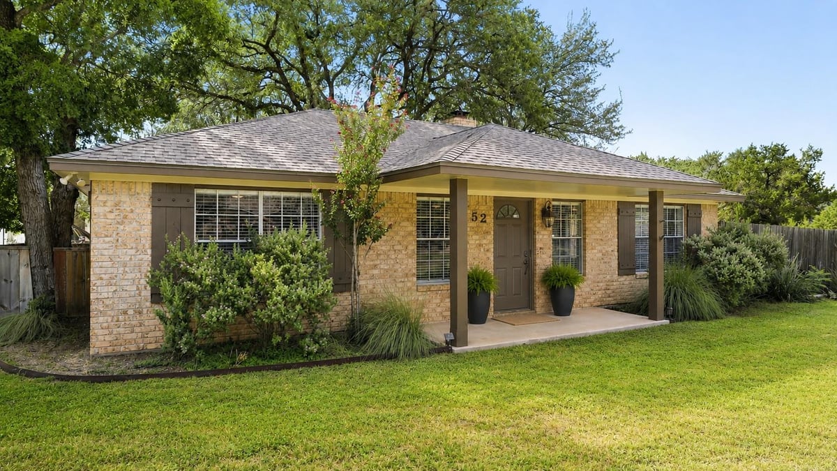 View 52 Persimmon DR in Woodcreek Sec 8 52 Persimmon DR - property photo 1 - Luxury home in Woodcreek Sec 8, Wimberley, TX