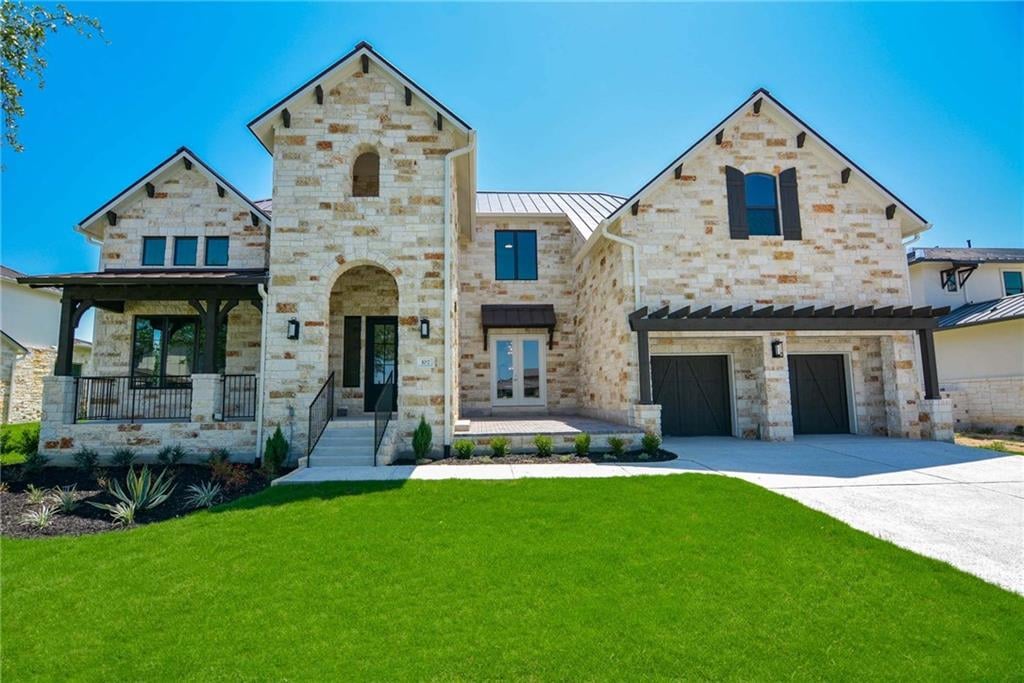 View 520 Woodside TER in Lakeway Highlands Ph 1 Sec 7b 520 Woodside TER - front exterior - Luxury home in Lakeway Highlands Ph 1 Sec 7b, Austin, TX