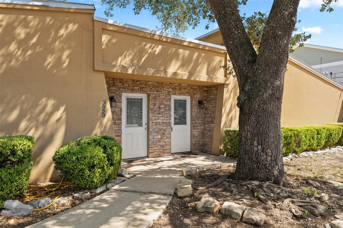 Primary bedroom at 521 & 525 W Hutchison St - Lindsey & Harvey Addn, San Marcos, TX