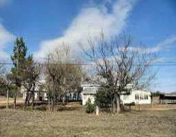 View 5239 Highway 71 5239 Highway 71 - front exterior - Luxury home in Del Valle, TX