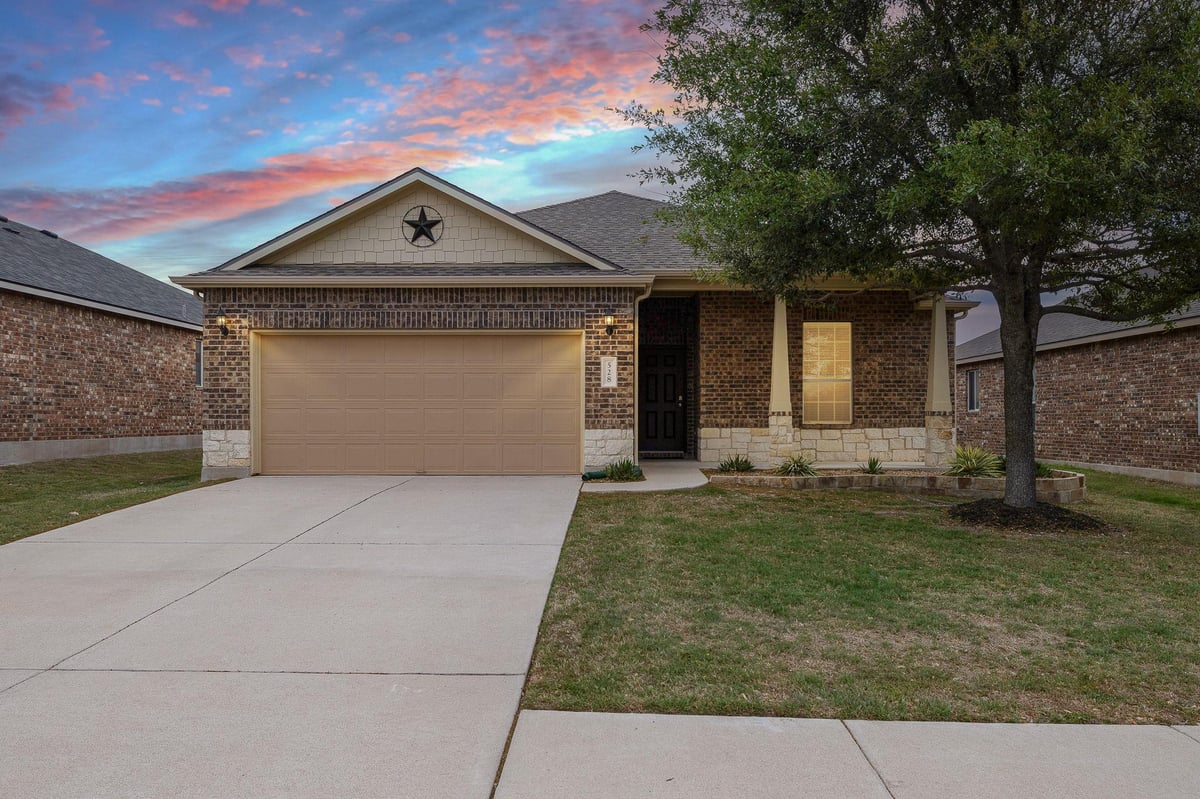 View 528 Hoot Owl Ln S in Summerlyn Ph P-5B 528 Hoot Owl Ln S - front exterior - Luxury home in Summerlyn Ph P-5B, Leander, TX