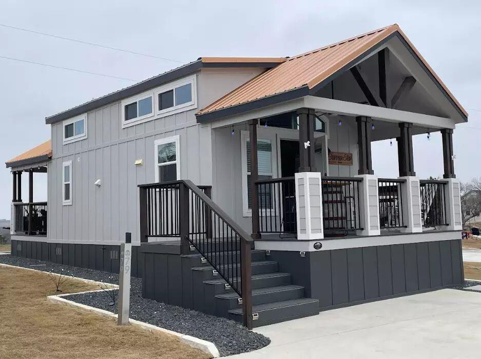 View 5386 Ranch Road 1376 Unit #79 in Firefly RV & Tiny Home Resort 5386 Ranch Road 1376 Unit #79 - front exterior - Luxury home in Firefly RV & Tiny Home Resort, Fredericksburg, TX
