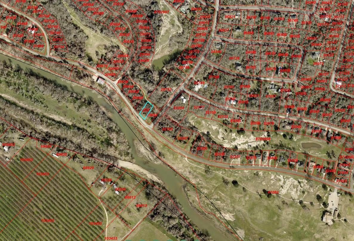 View 542 Riverside DR in Tahitian Village, 542 Riverside DR - front exterior - Luxury lot in Tahitian Village,, Bastrop, TX