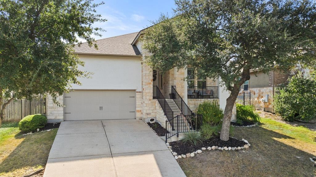 View 5433 Texas Bluebell Dr in West Cypress Hills 5433 Texas Bluebell Dr - front exterior - Luxury home in West Cypress Hills, Spicewood, TX
