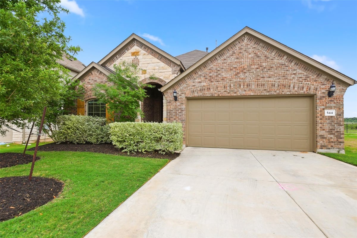 View 544 Cherrystone Loop in Sunfield Ph Three Sec Five C 544 Cherrystone Loop - front exterior - Luxury home in Sunfield Ph Three Sec Five C, Buda, TX