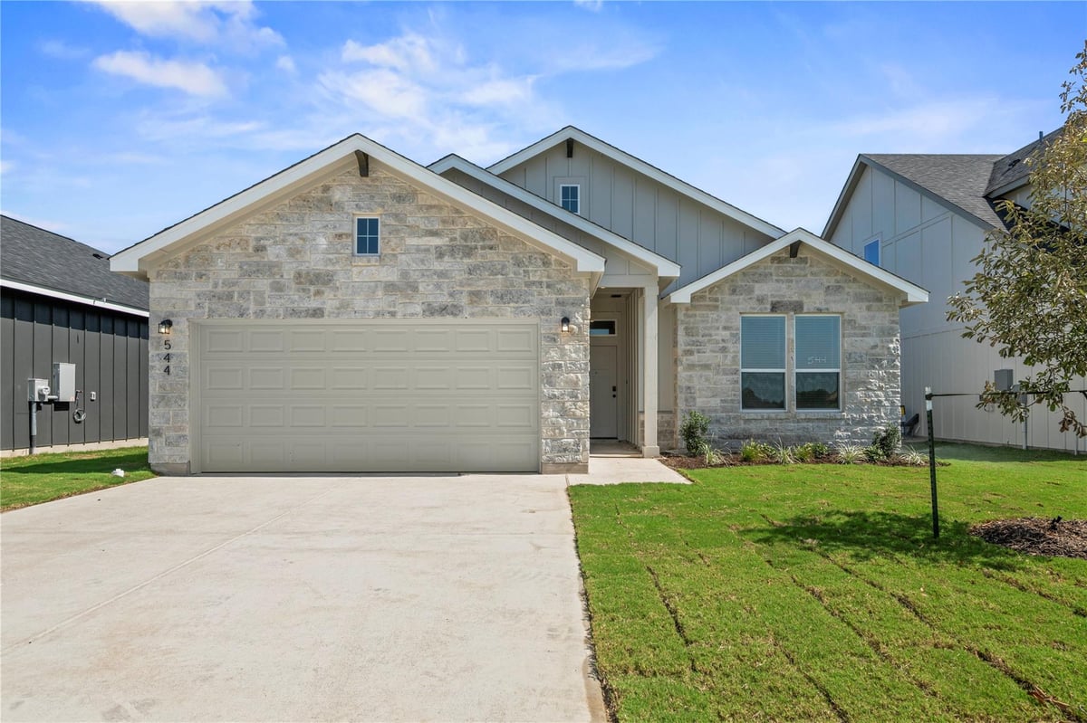 View 544 Gus LOOP in Rancho San Gabriel 544 Gus LOOP - front exterior - Luxury home in Rancho San Gabriel, Georgetown, TX