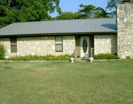 View 547 Patterson RD 547 Patterson RD - front exterior - Luxury home in Smithville, TX
