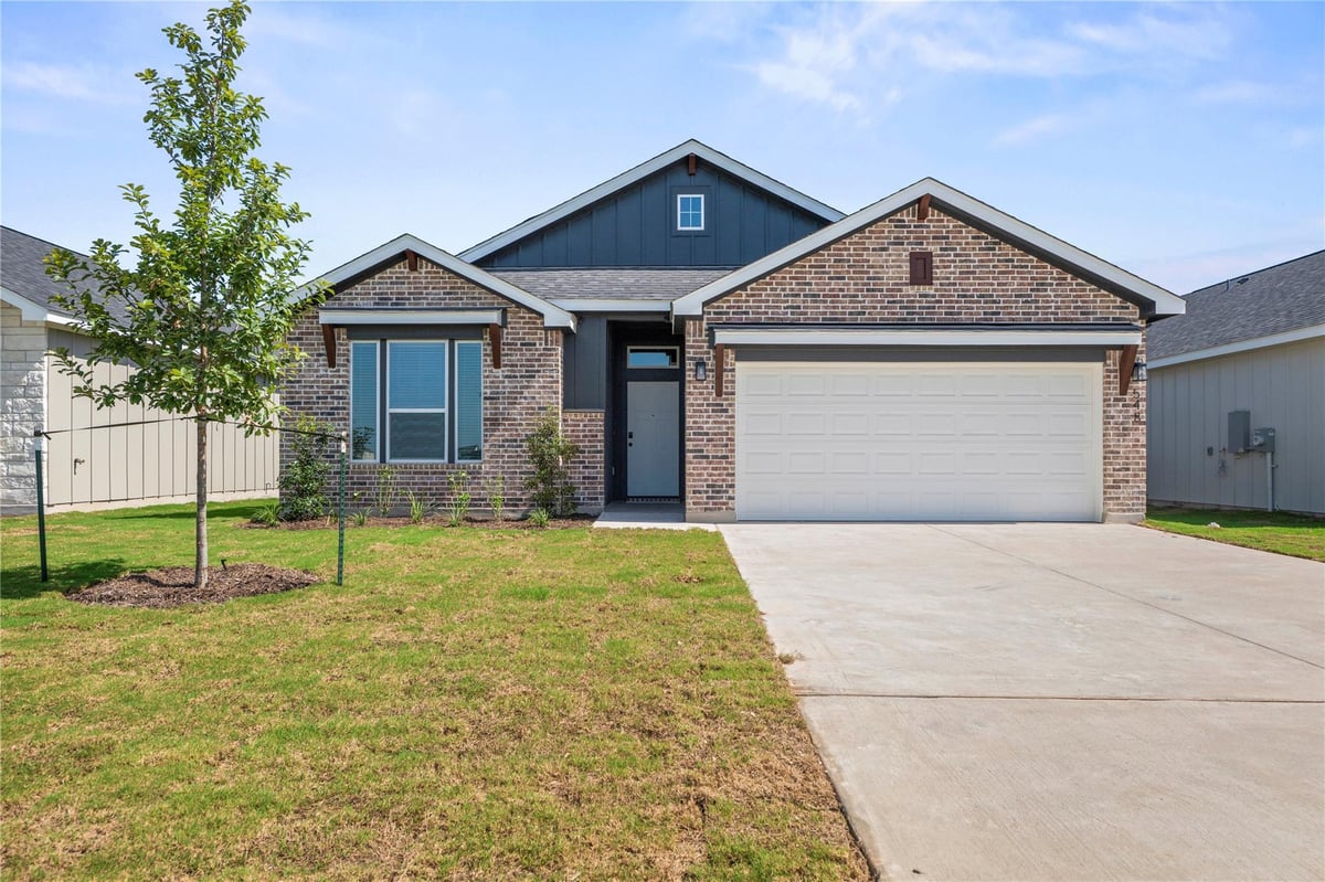 View 548 Gus LOOP in Rancho San Gabriel 548 Gus LOOP - front exterior - Luxury home in Rancho San Gabriel, Georgetown, TX