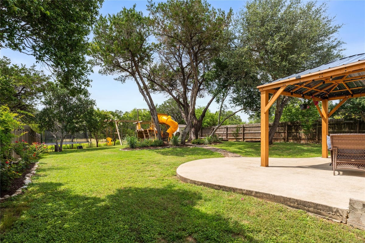 View 55 Sprucewood DR in Woodcreek Sec 20 55 Sprucewood DR - front exterior - Luxury home in Woodcreek Sec 20, Wimberley, TX