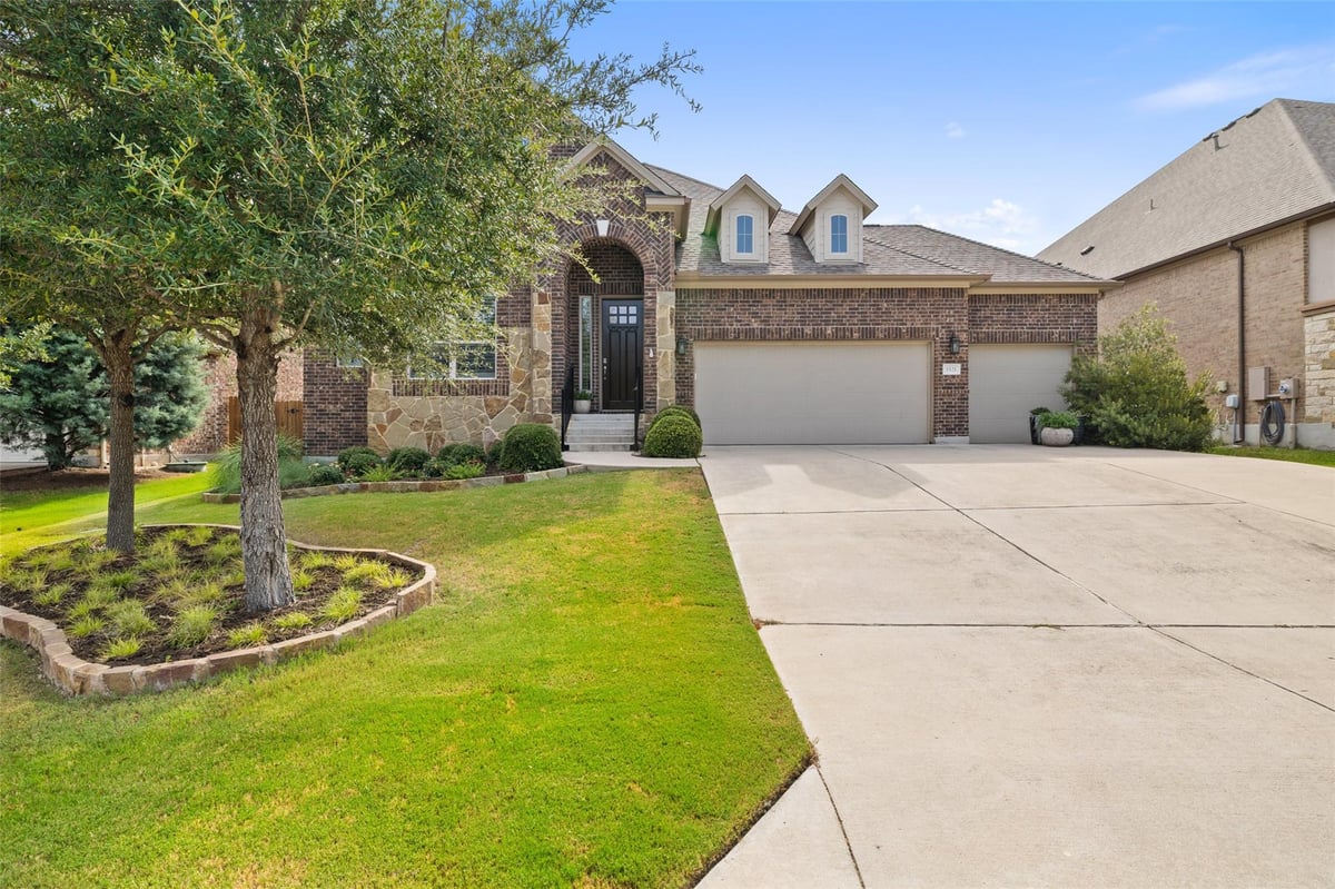 View 5521 Cherokee Draw RD in Sweetwater Sec 1 Village G-1 5521 Cherokee Draw RD - front exterior - Luxury home in Sweetwater Sec 1 Village G-1, Austin, TX