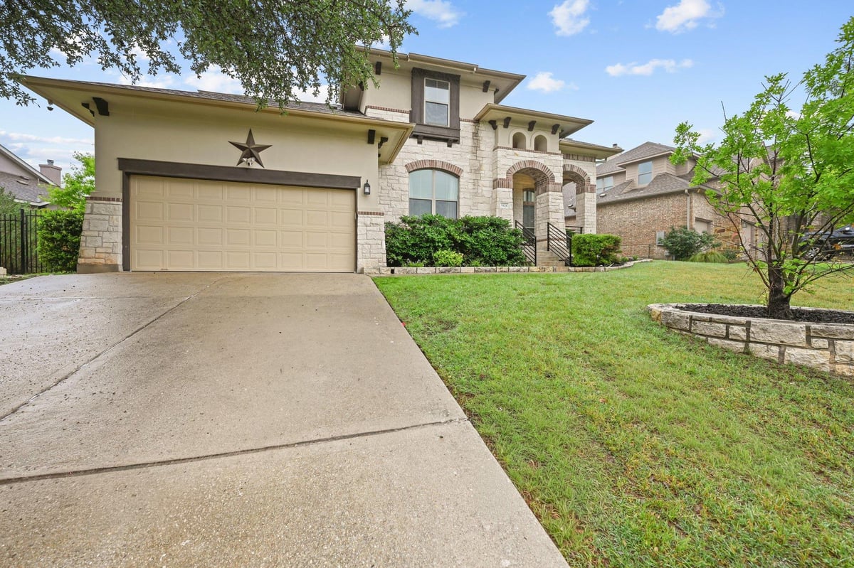 View 5528 Wild Foxglove Rd in West Cypress Hills Ph 1 Sec 2 5528 Wild Foxglove Rd - front exterior - Luxury home in West Cypress Hills Ph 1 Sec 2, Spicewood, TX