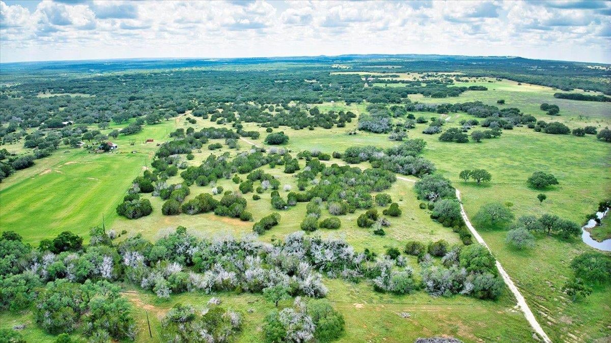Primary bedroom at 555 Summer Hill Ln - 33.62 Acres, Johnson City, TX