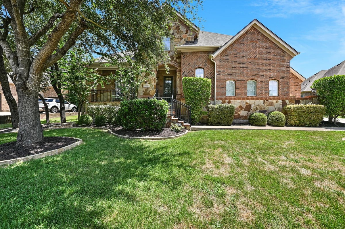 View 560 Aspen DR in Belterra Ph 02 Sec 05c 560 Aspen DR - front exterior - Luxury home in Belterra Ph 02 Sec 05c, Austin, TX
