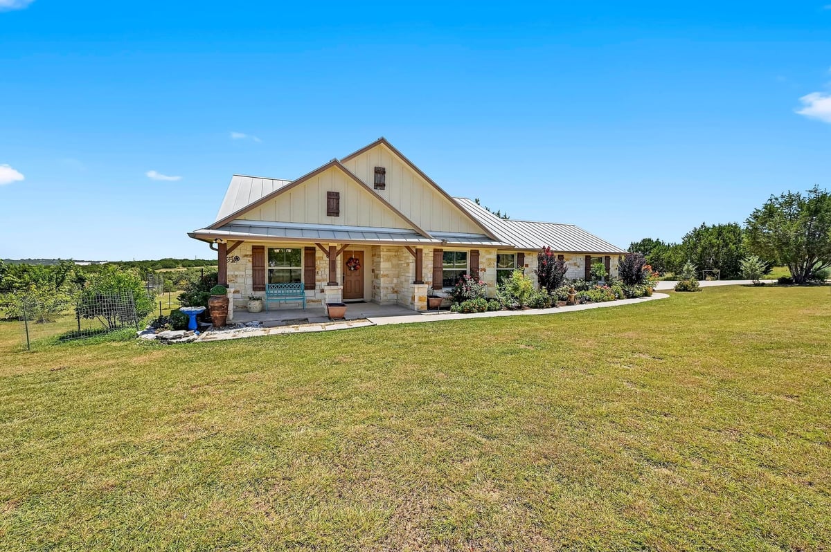 View 560 Saddle Ridge Dr in Ranches At Canyon Creek 560 Saddle Ridge Dr - front exterior - Luxury home in Ranches At Canyon Creek, Bertram, TX