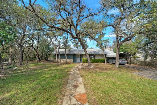 View 5600 Lakeview Dr in Lakeland Hills Sec 01 5600 Lakeview Dr - front exterior - Luxury home in Lakeland Hills Sec 01, Austin, TX