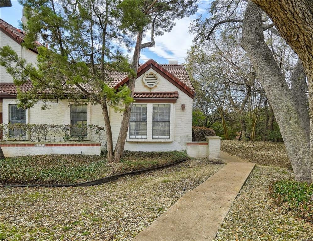 View 5604 Bonnell Vista ST Unit #E-6 in Stoneledge 02 Condo Ph 02 Amd 5604 Bonnell Vista ST Unit #E-6 - front exterior - Luxury home in Stoneledge 02 Condo Ph 02 Amd, Austin, TX