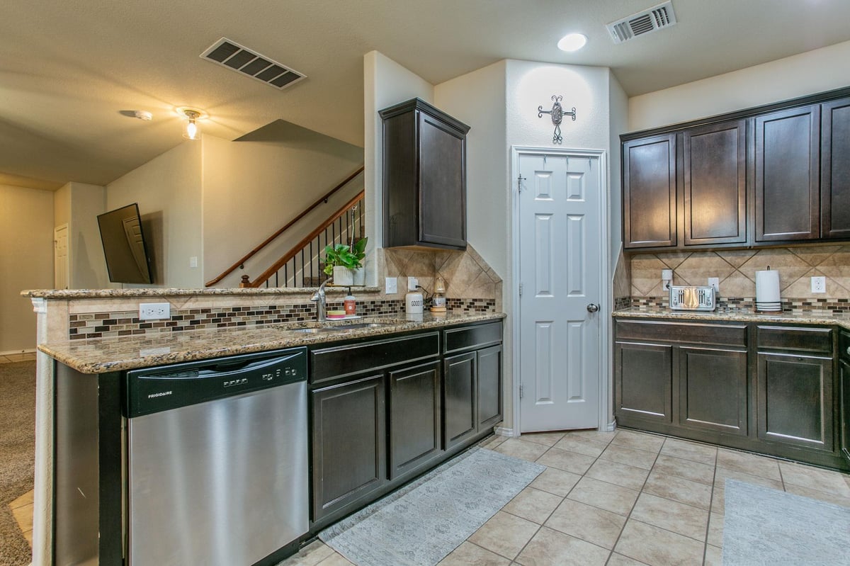 Primary bedroom at 5646 Stonehaven Dr - 4 bed 2 bath home