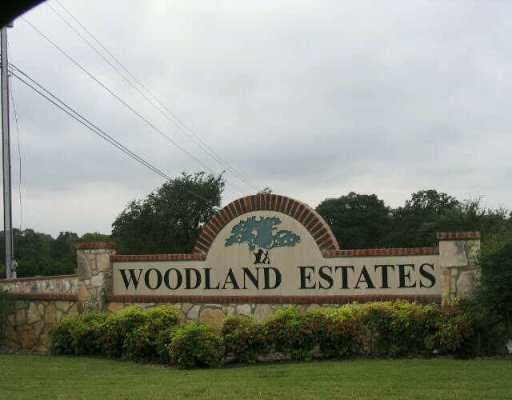 View 570 Woodland DR 570 Woodland DR - front exterior - Luxury lot in Dripping Springs, TX