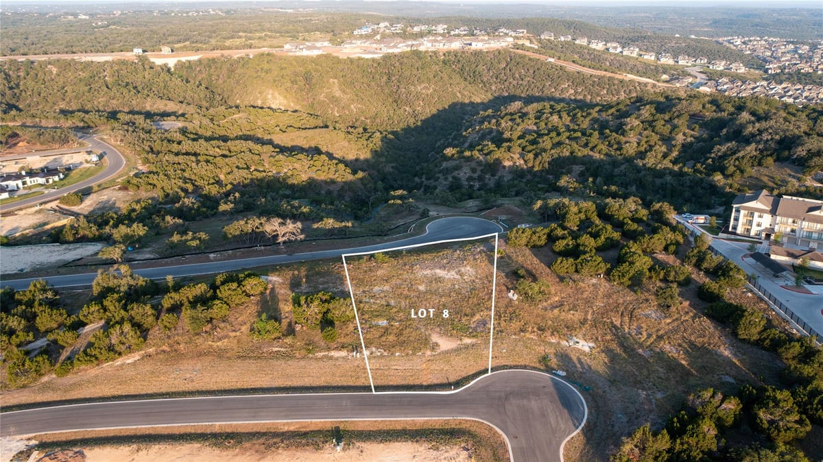 View 5704 TWIN PEAKS Trce in Madrone Canyon 5704 TWIN PEAKS Trce - front exterior - Luxury lot in Madrone Canyon, Austin, TX