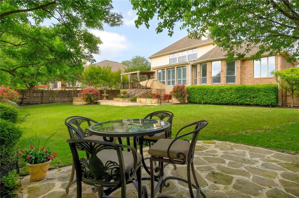 View 571 Aspen Dr in Belterra 571 Aspen Dr - front exterior - Luxury home in Belterra, Austin, TX