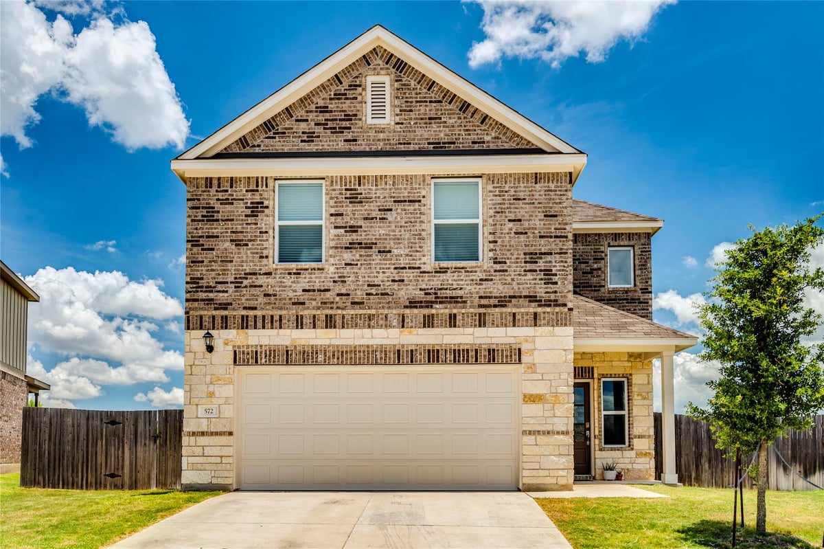 View 572 Pepperbark LOOP in Sunfield Ph Four Sec One A 572 Pepperbark LOOP - front exterior - Luxury home in Sunfield Ph Four Sec One A, Buda, TX