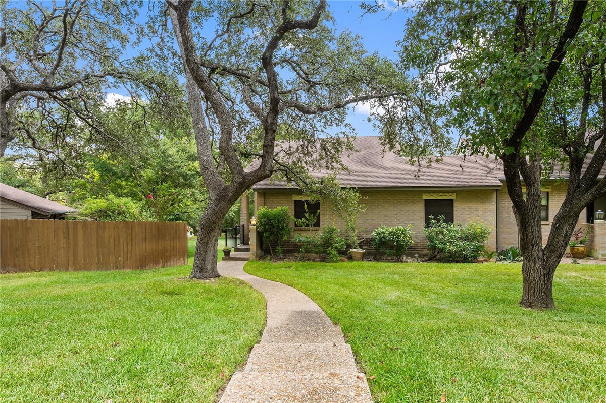 View 5725 N Scout Island CIR in Courtyard Ph 06 5725 N Scout Island CIR - front exterior - Luxury home in Courtyard Ph 06, Austin, TX