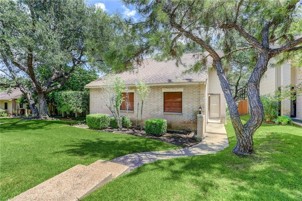 View 5731 N Scout Island Cir in Courtyard Ph 06 5731 N Scout Island Cir - front exterior - Luxury home in Courtyard Ph 06, Austin, TX