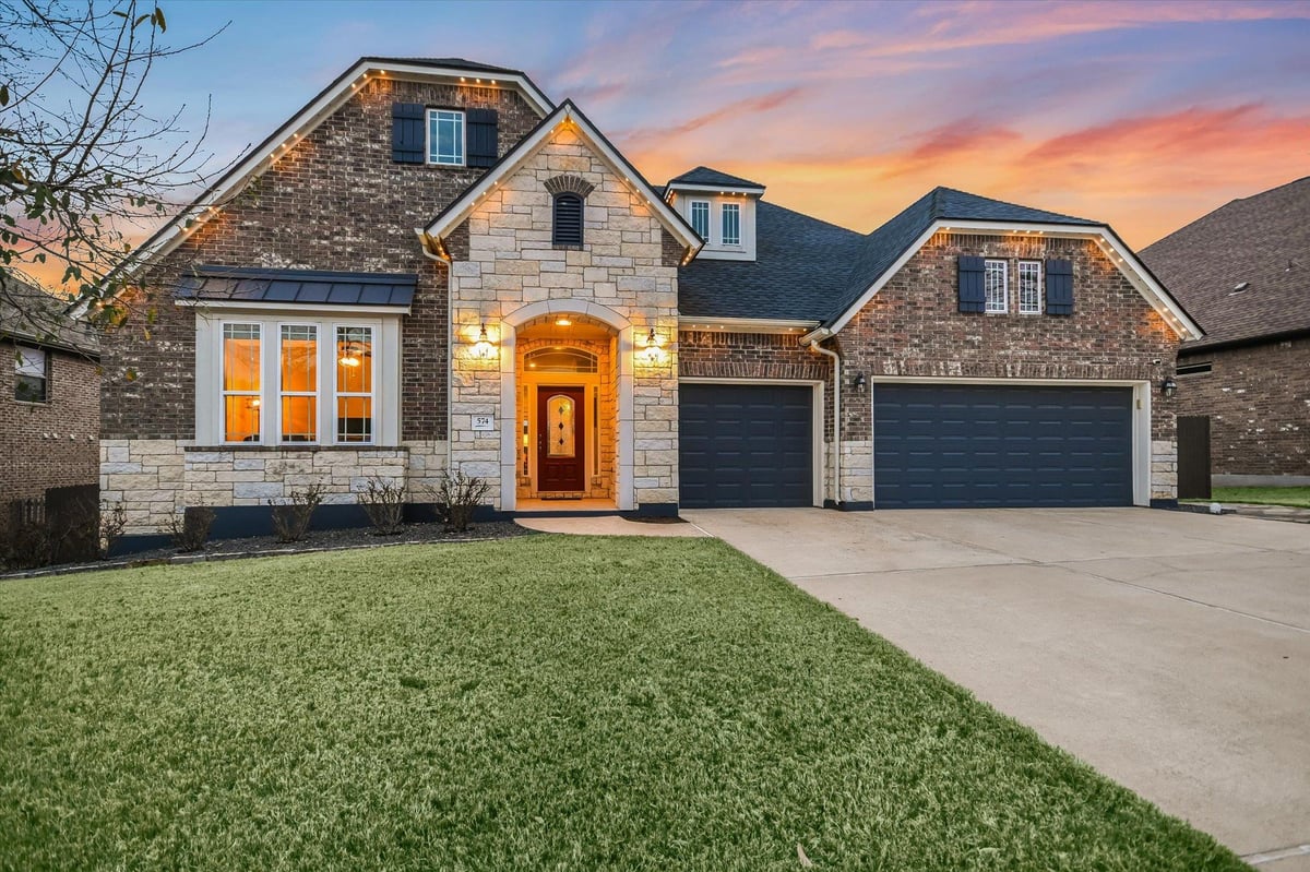 View 574 Merion DR in Belterra Ph 4 Sec 13 574 Merion DR - front exterior - Luxury home in Belterra Ph 4 Sec 13, Austin, TX