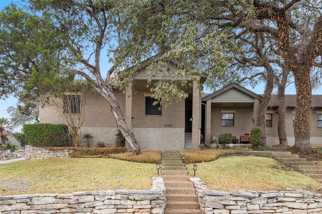 View 5752 N Scout Island Cir in Courtyard Ph 06 5752 N Scout Island Cir - front exterior - Luxury home in Courtyard Ph 06, Austin, TX