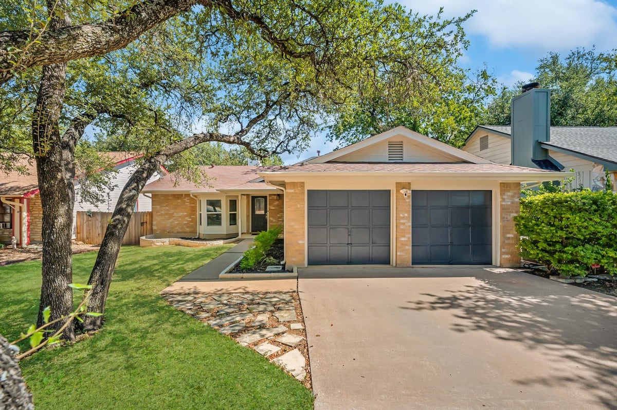 View 5810 Secrest DR in Raintree Estates 5810 Secrest DR - property photo 1 - Luxury home in Raintree Estates, Austin, TX
