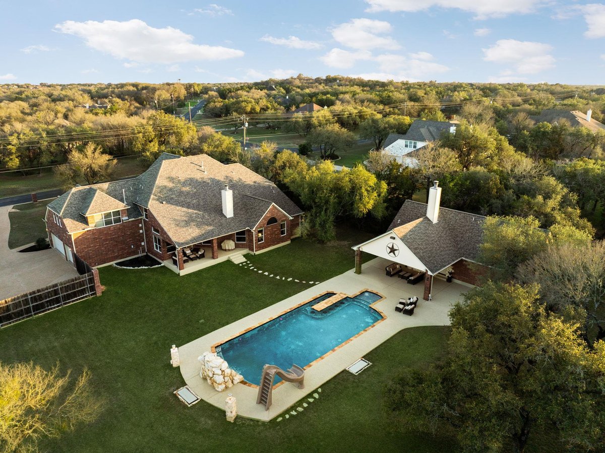 View 583 W Overlook Mountain Rd in Elliott Ranch Ph Three 583 W Overlook Mountain Rd - front exterior - Luxury home in Elliott Ranch Ph Three, Buda, TX