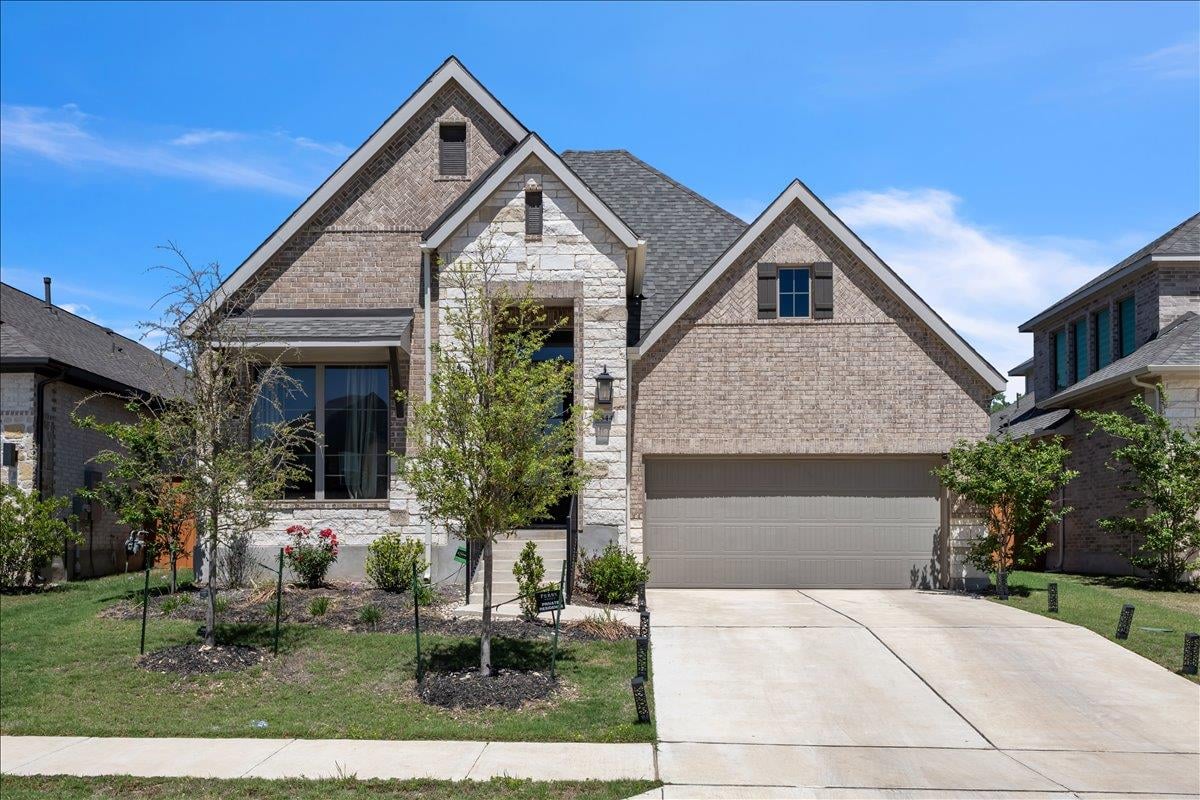 View 5844 Sean Paul Ln in Parkside Peninsula 5844 Sean Paul Ln - front exterior - Luxury home in Parkside Peninsula, Georgetown, TX