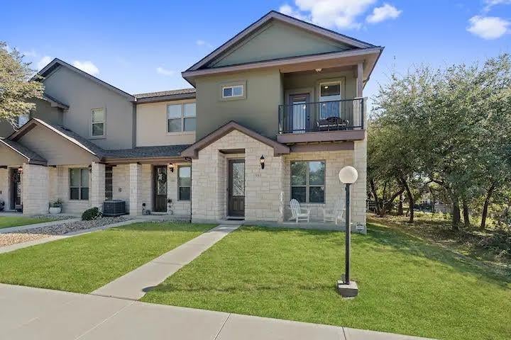 View 585 Demarett Dr in Point Venture Highpoint Townhomes 585 Demarett Dr - front exterior - Luxury home in Point Venture Highpoint Townhomes, Point Venture, TX