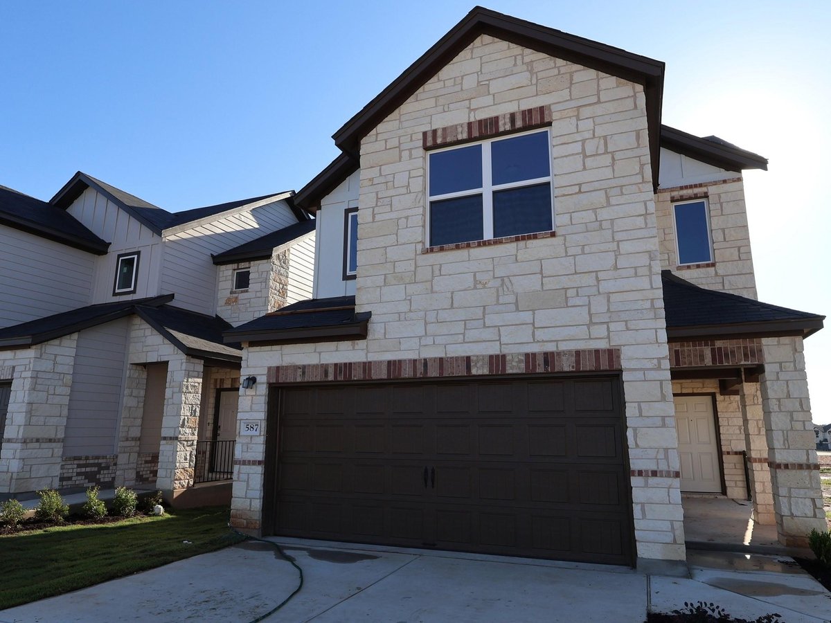 View 587 Bishop Wood Rd in Heritage 587 Bishop Wood Rd - front exterior - Luxury home in Heritage, Dripping Springs, TX