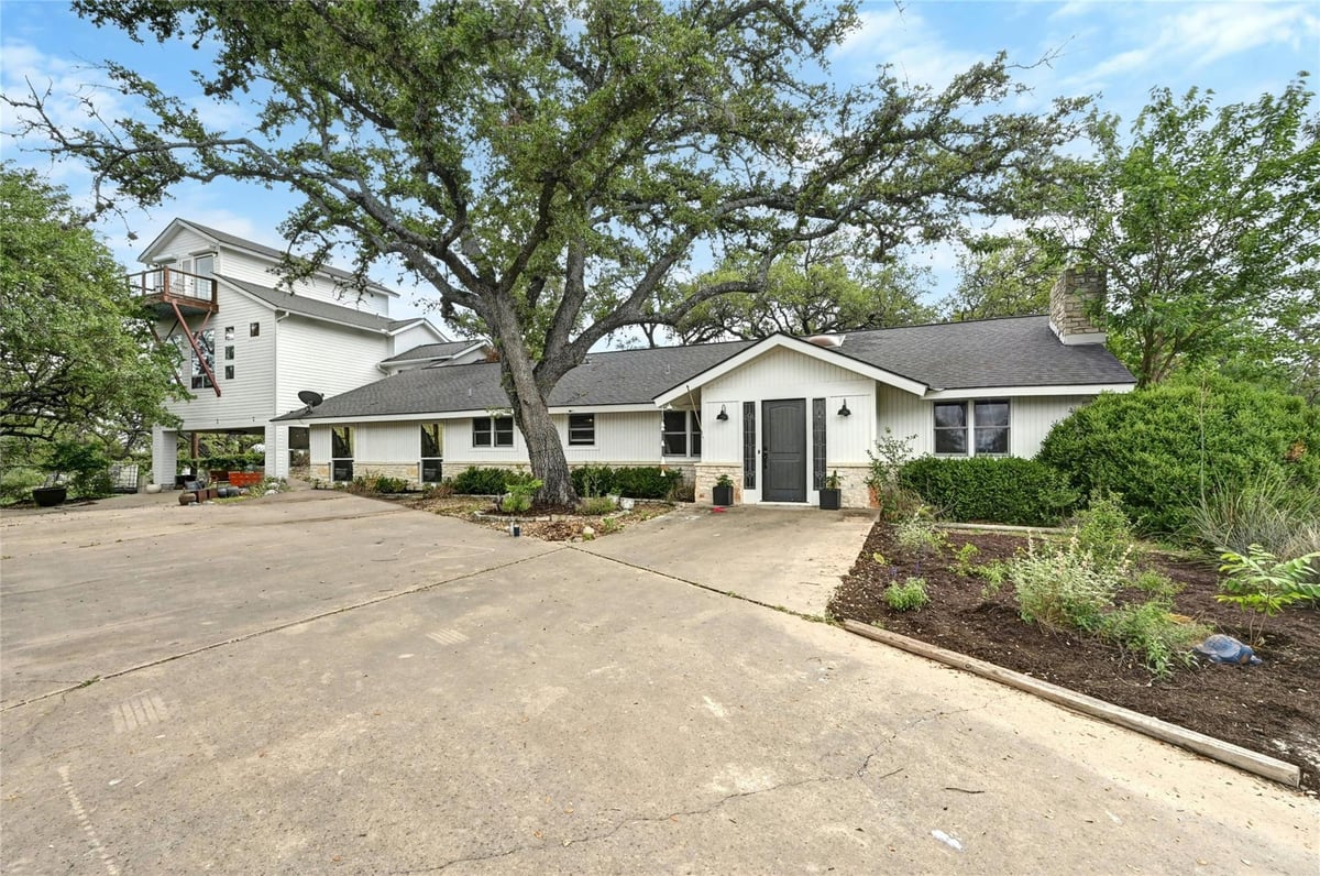View 5901 Lakeview Dr in Lakeland Hills Sec 01 5901 Lakeview Dr - front exterior - Luxury home in Lakeland Hills Sec 01, Austin, TX