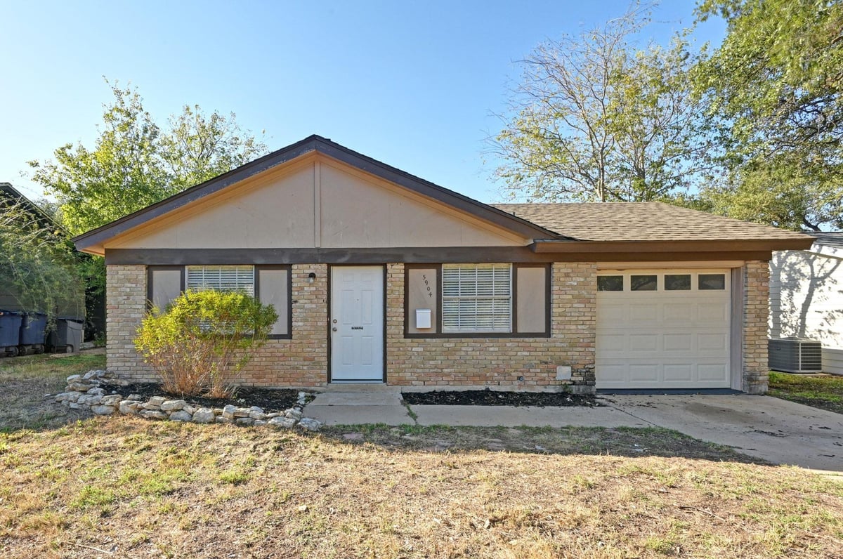 View 5904 Garden Oaks DR in Flournoys Sweetbriar Sec 05 5904 Garden Oaks DR - front exterior - Luxury home in Flournoys Sweetbriar Sec 05, Austin, TX