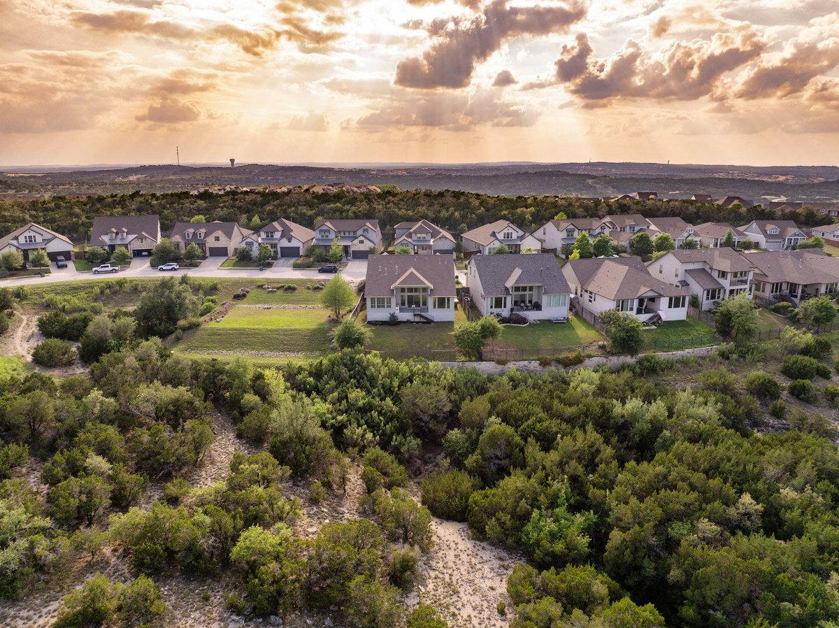 View 595 Dayridge DR in Headwaters At Barton Creek Ph 1 595 Dayridge DR - front exterior - Luxury home in Headwaters At Barton Creek Ph 1, Dripping Springs, TX