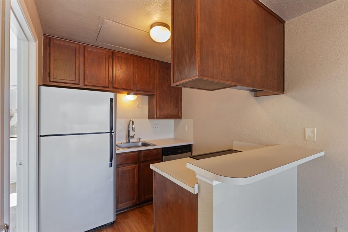 Kitchen at 601 Nelray Blvd Unit #17 - 1 bed 1 bath home